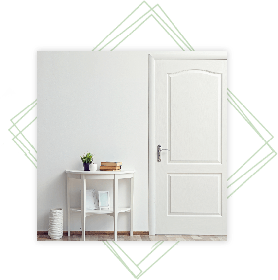 White interior door with a small table